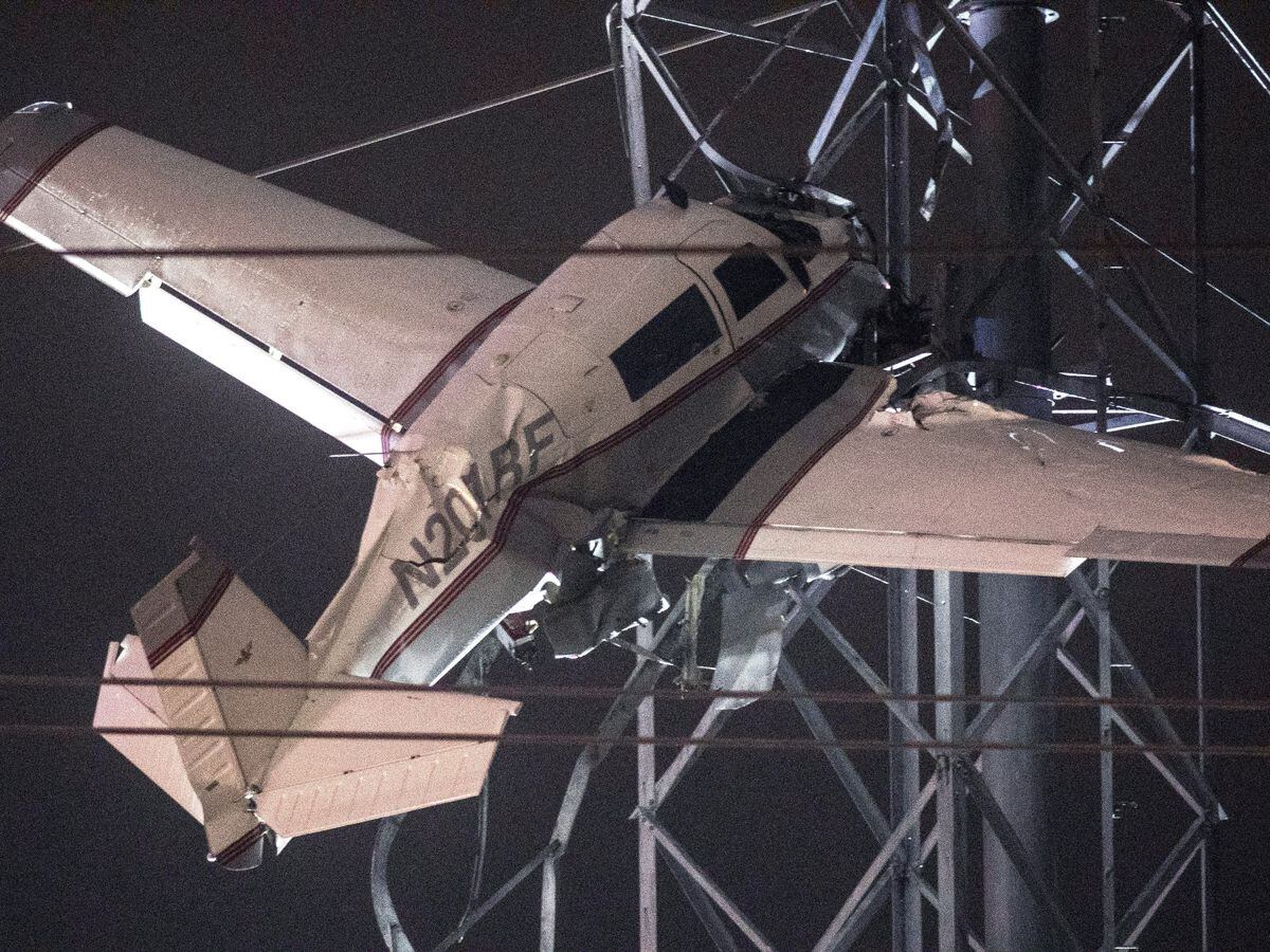 A plane caught in power lines