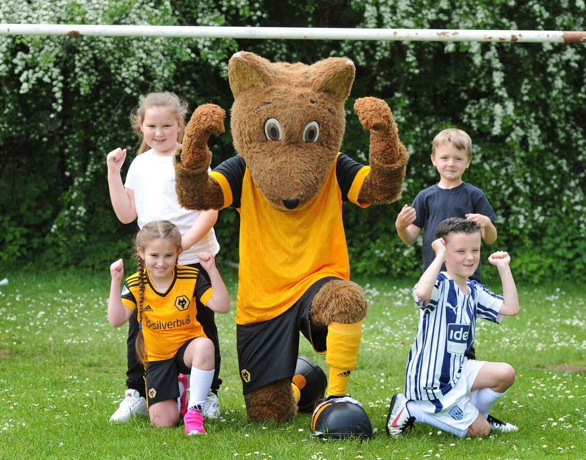 Wolves mascot Wolfie visits Coseley school for penalty shootout ...