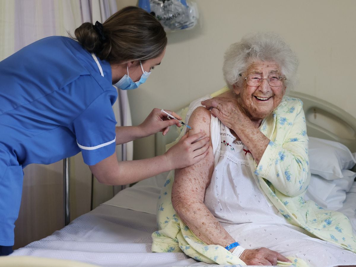 Great-grandmother looking forward to a hug after vaccination