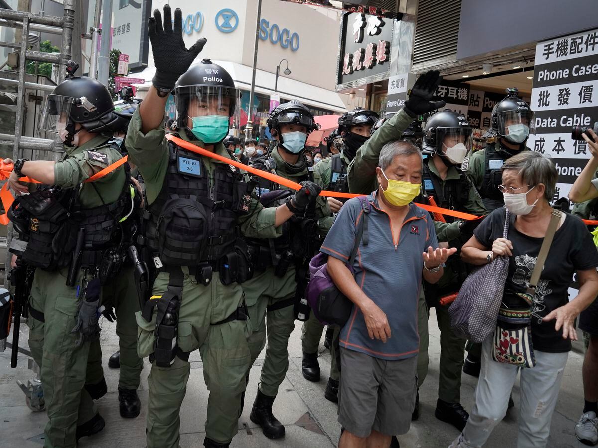 Hong Kong police arrest 60 for protesting on Chinese holiday | Express ...