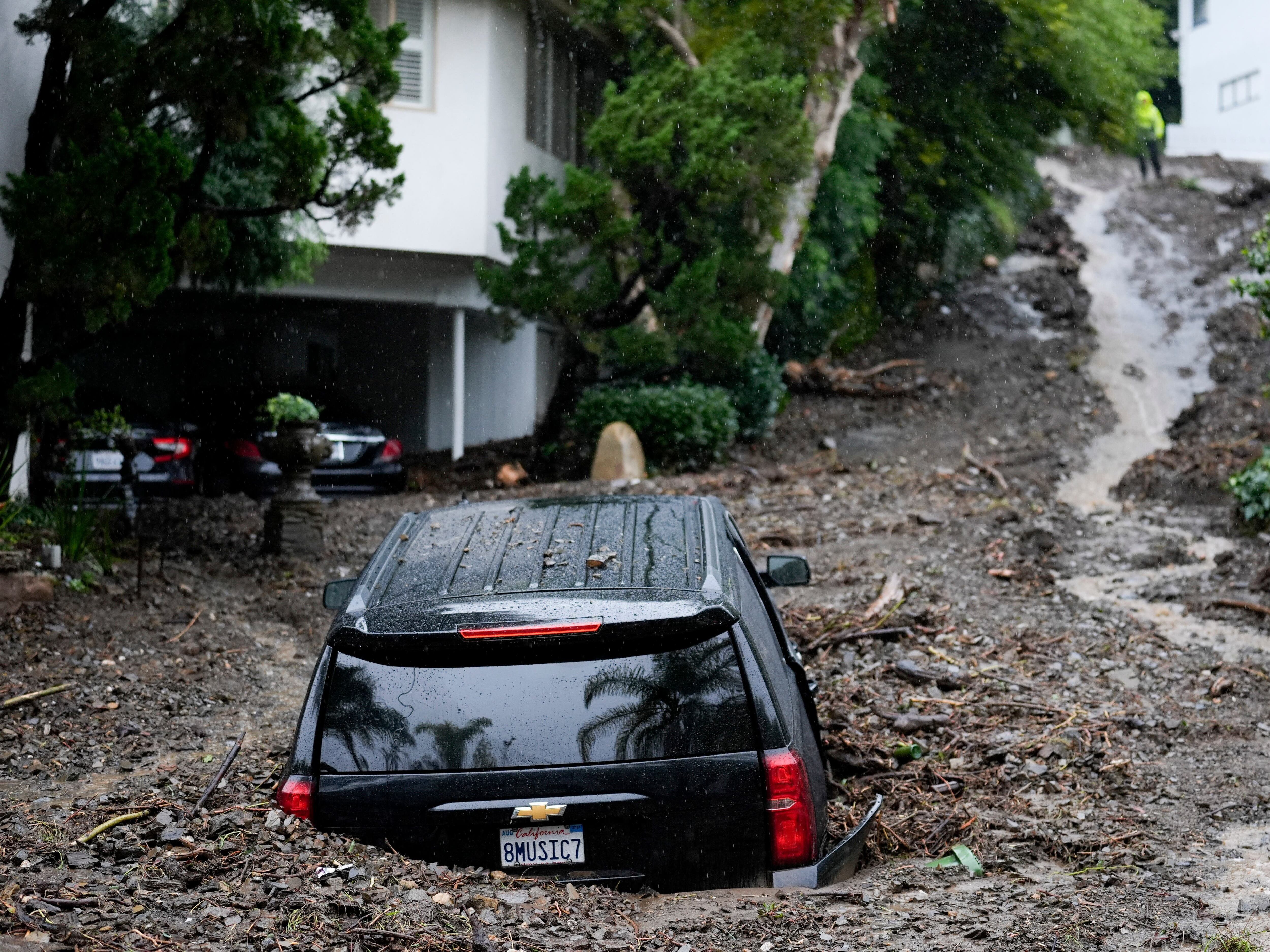 Massive storm sends mud and debris flowing through LA’s Hollywood Hills