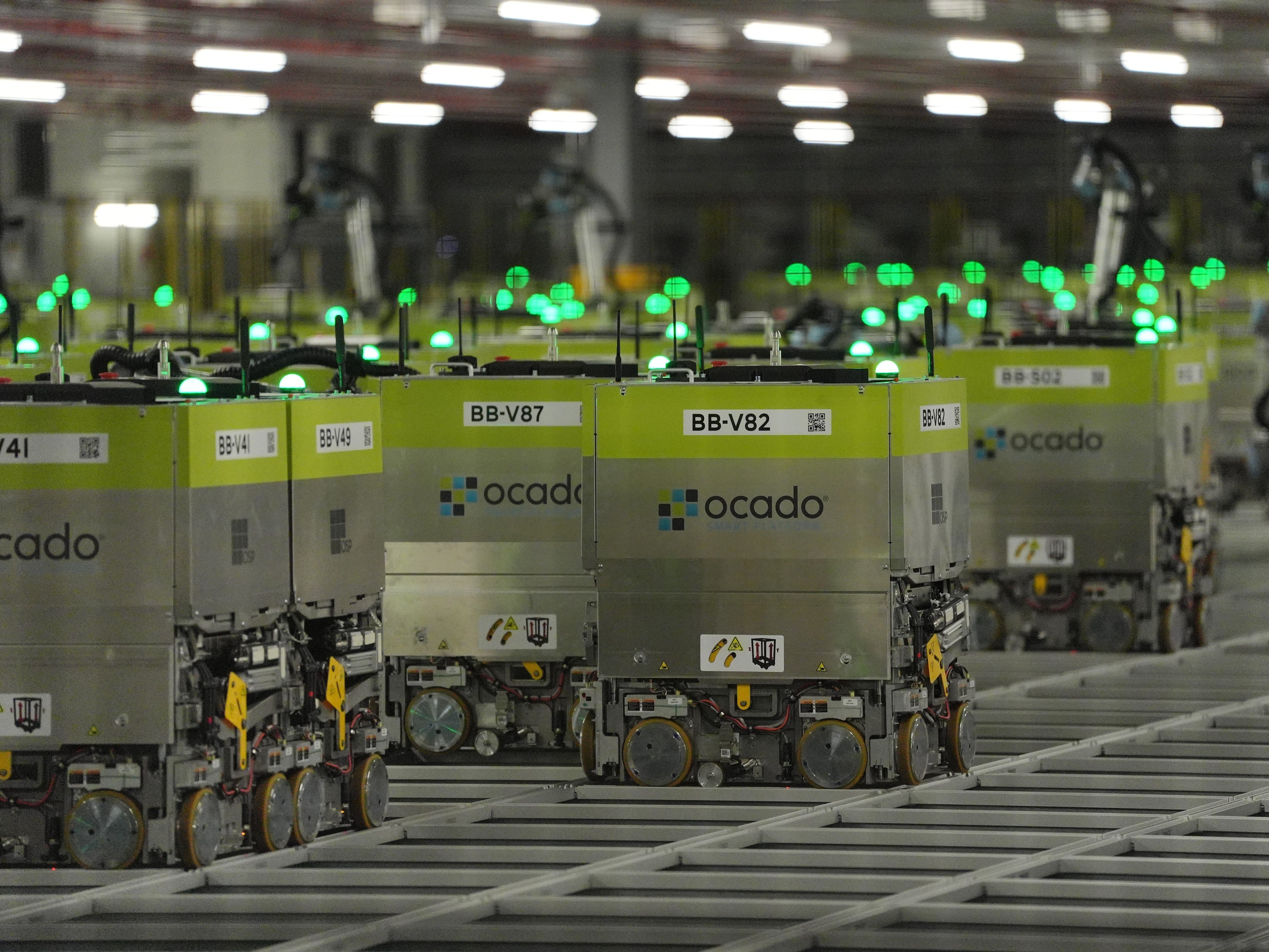 Ocado narrows losses and raises outlook for robotic warehouse arm