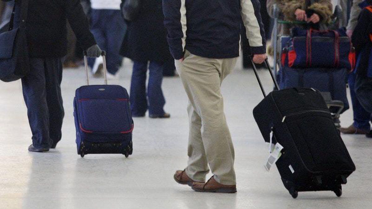 Passengers pile on extra clothes to avoid baggage fees | Express & Star