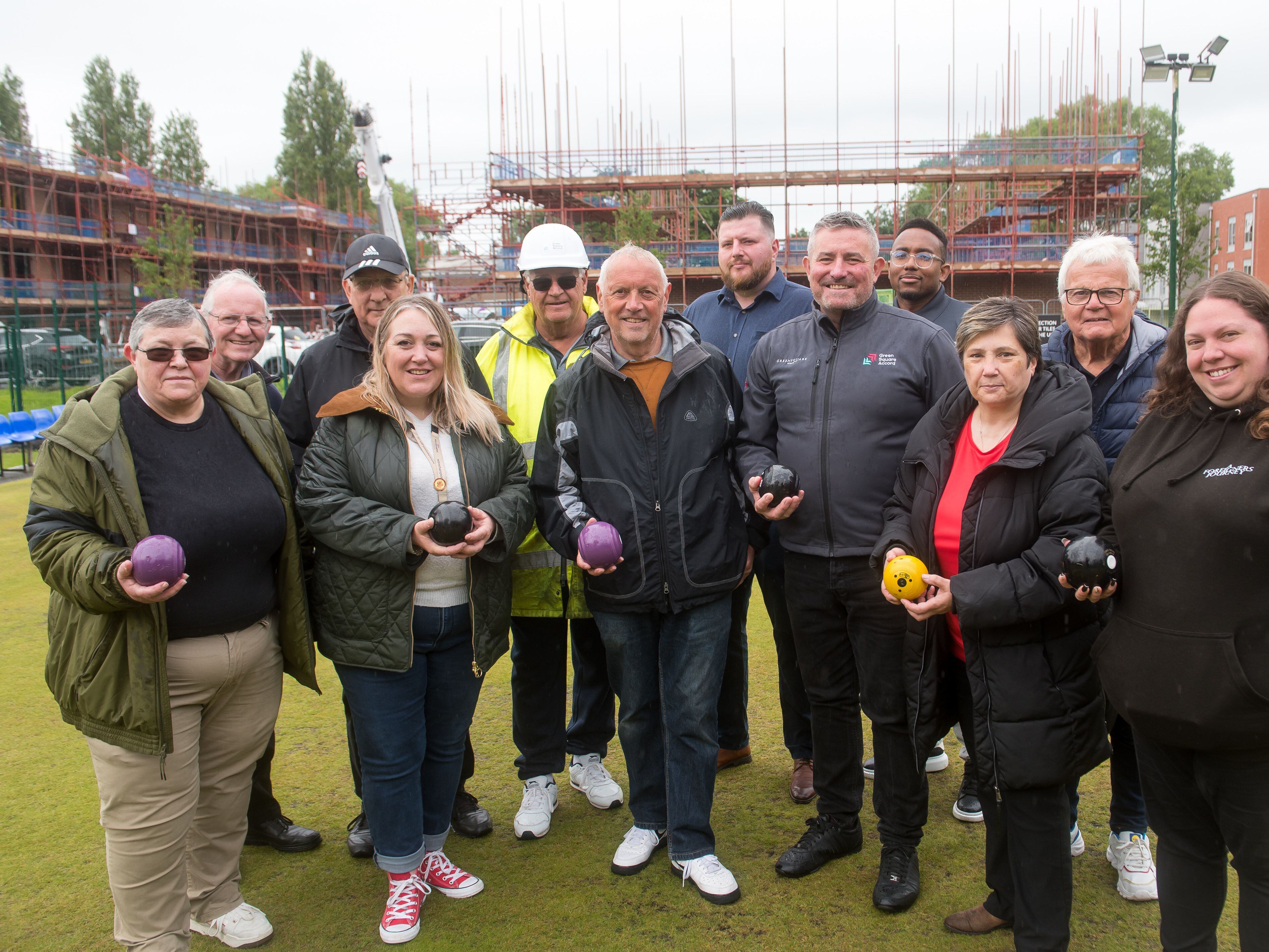 Jack of all trades! Bowling club hosts open day for workers building neighbouring affordable estate