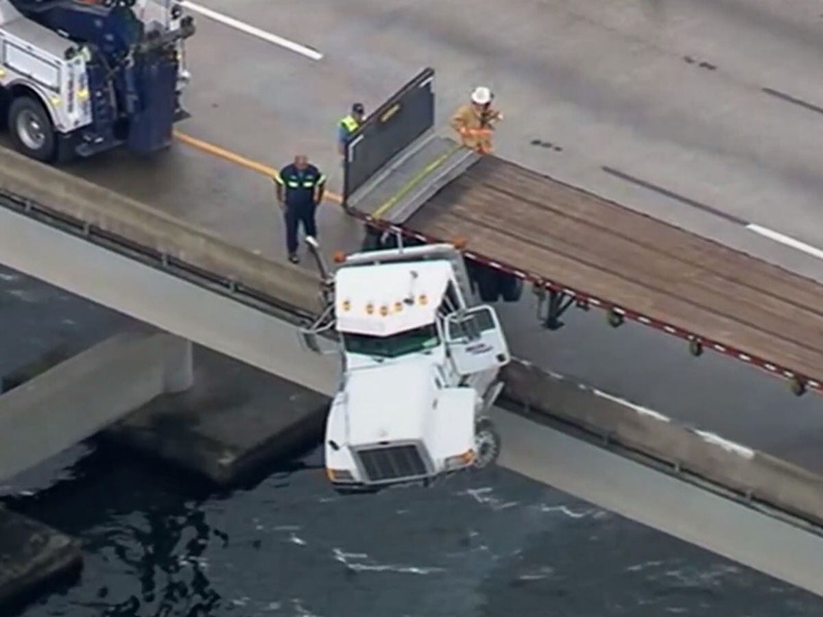 In Video: Truck Cab Dangles Over Side Of Bridge After Crash | Express ...