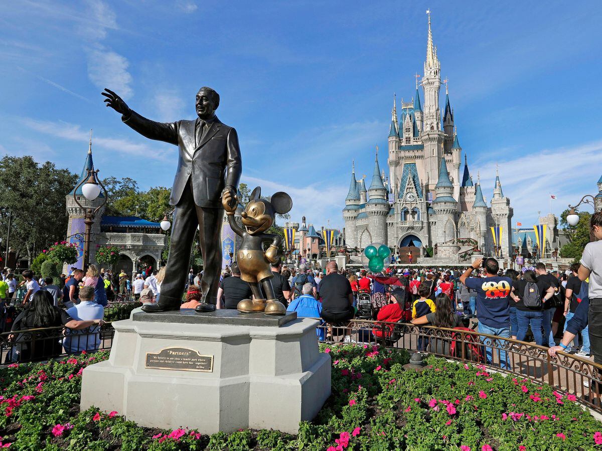 A statue of Walt Disney at Walt Disney World