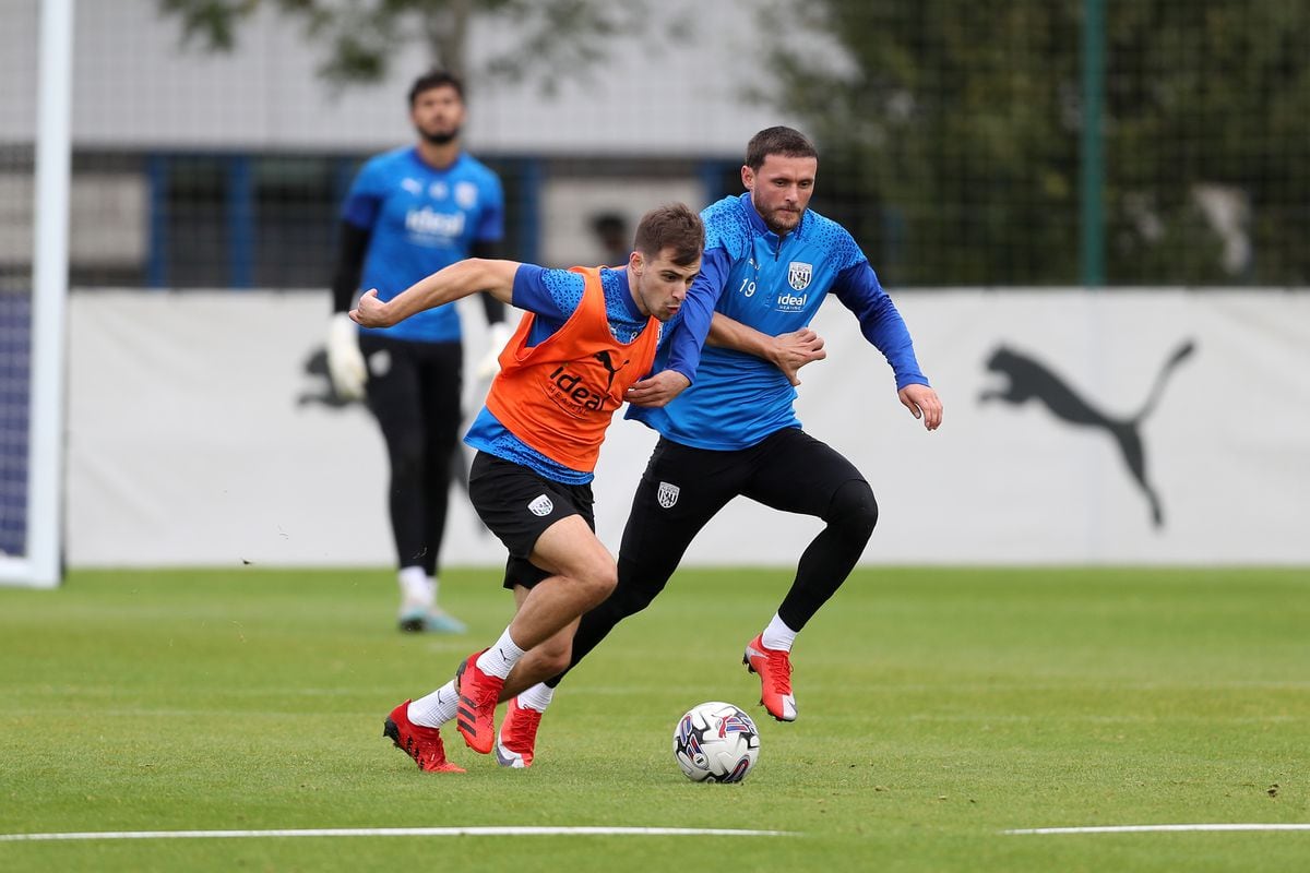 John Swift battling for possession in training with Jayson Molumby (Photo by Adam Fradgley/West Bromwich Albion FC via Getty Images).