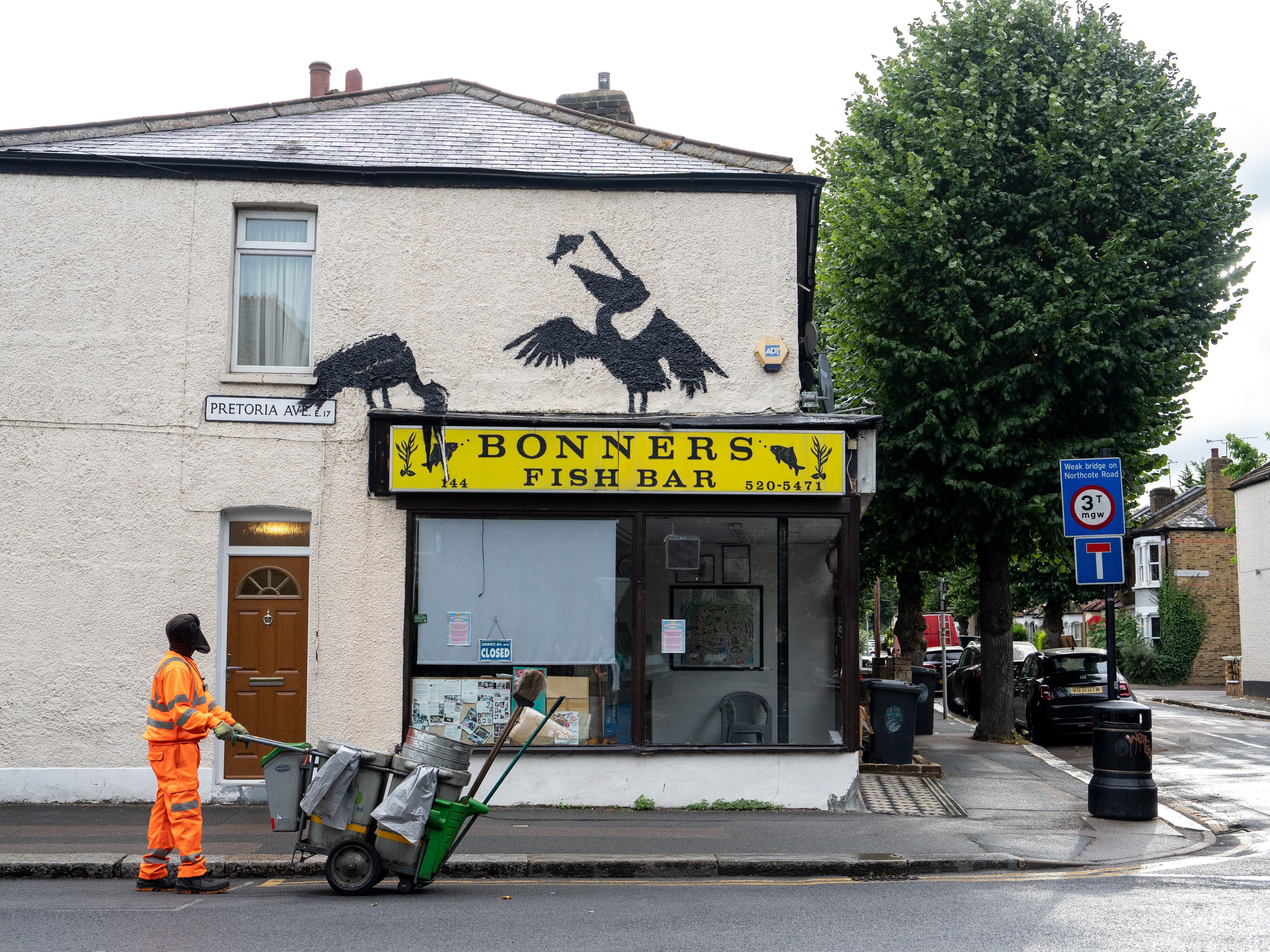 Fifth Banksy artwork of week depicts pelicans pinching fish from chip shop