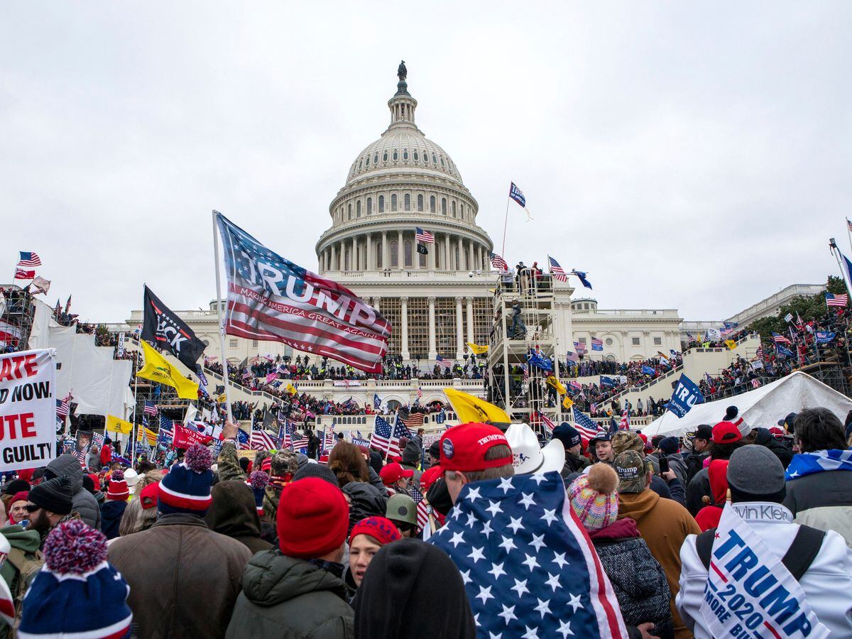 A mob loyal to former U.S. President Donald Trump rallies at the U.S. Capitol in Washington on January 6, 2021