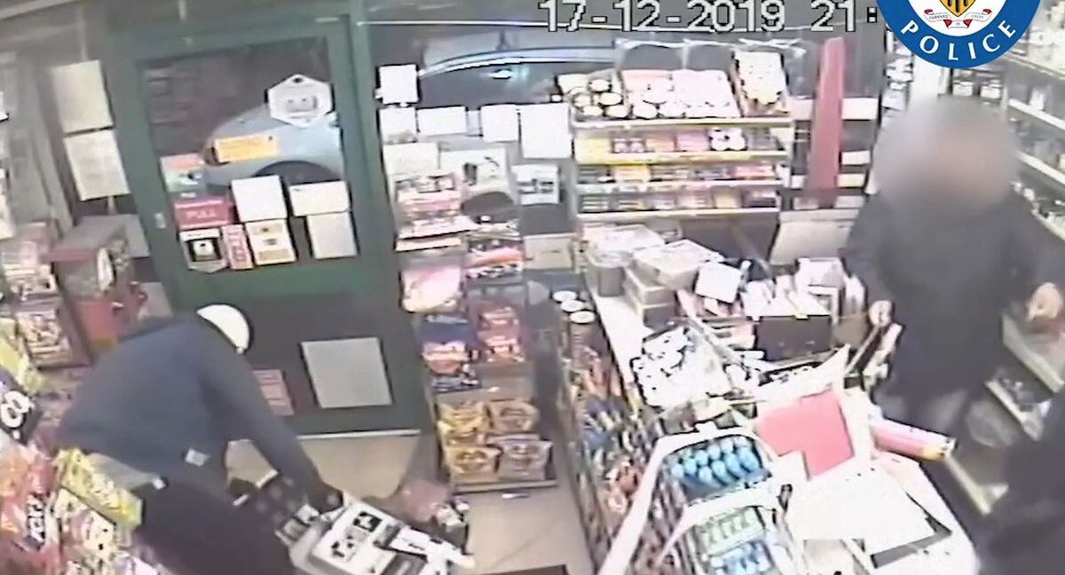 'This was a nasty robbery': Police hunt masked raiders who struck shop ...