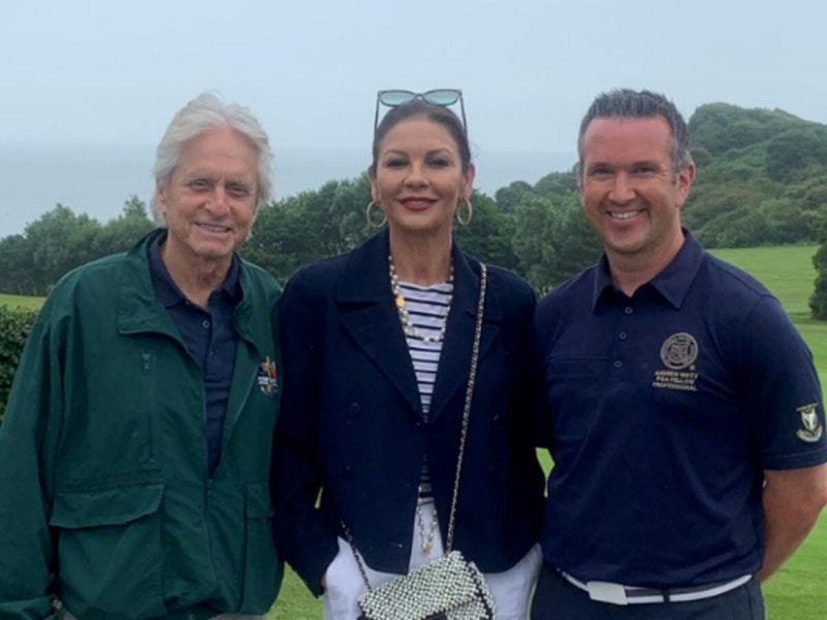 Catherine Zeta-Jones and Michael Douglas at golf course before Swansea ...