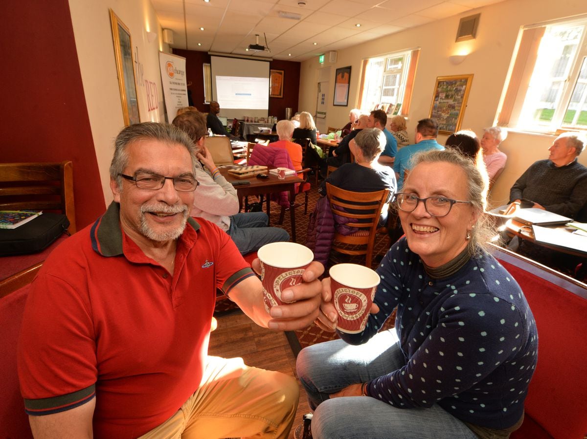 Inside the warm hub, Penn Residents Association vice chair Arko Sen and chair Debbie Peach, at Penn Bowling Club.