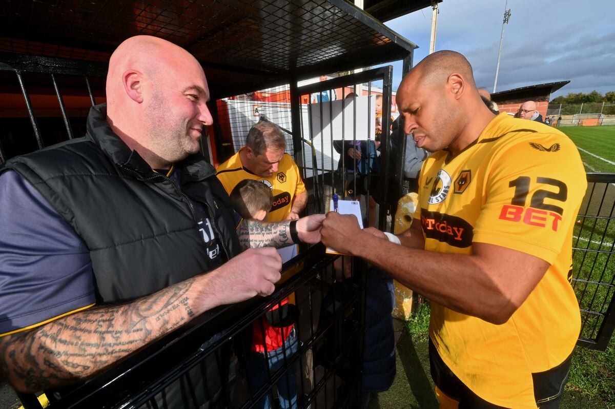 Matt Hill signs his autograph for Stuart Oakes.