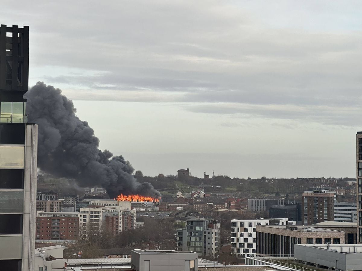 Major incident declared amid fears huge fire may cause building to ...