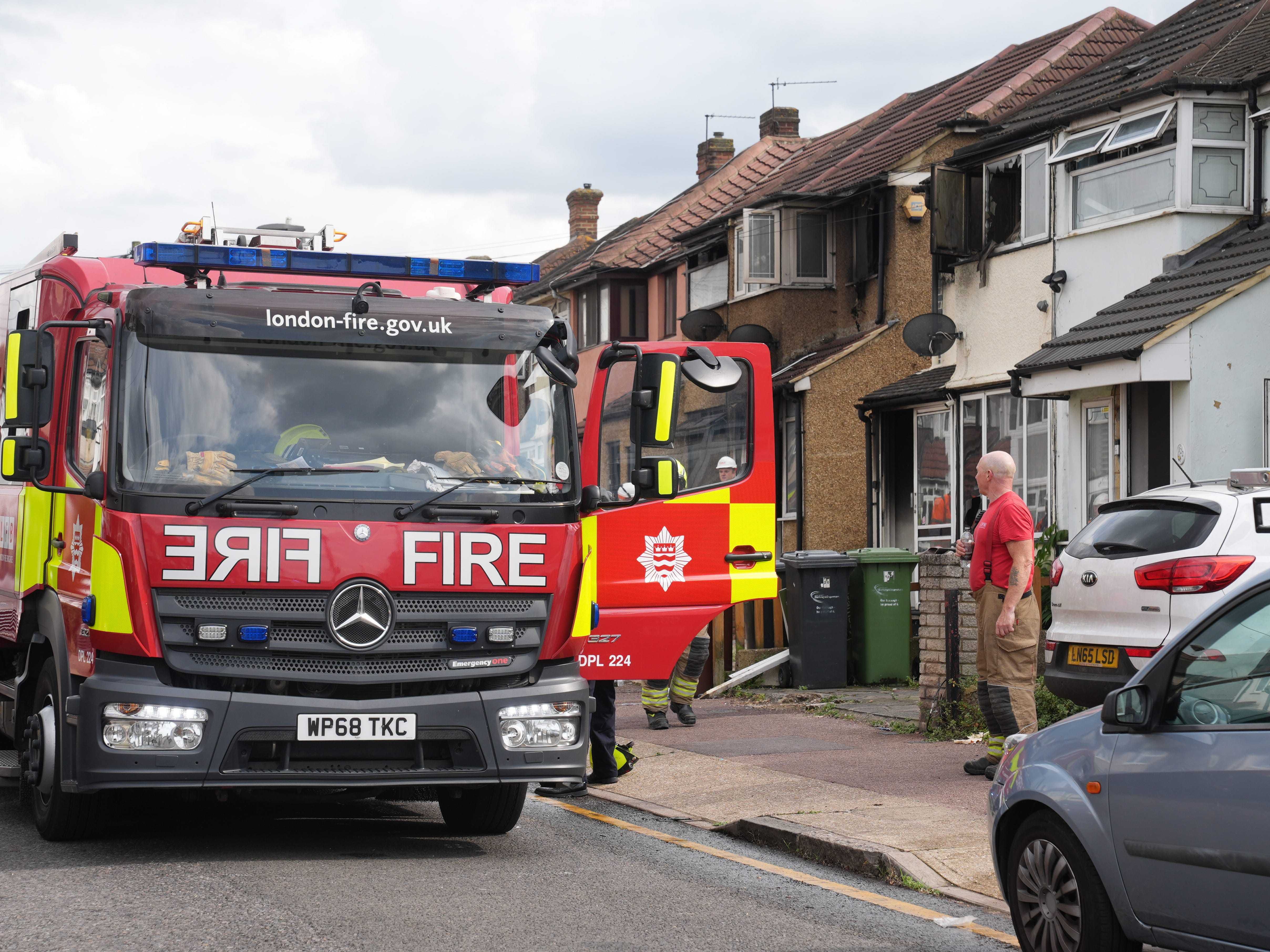 Around 100 firefighters tackle double house blaze in east London