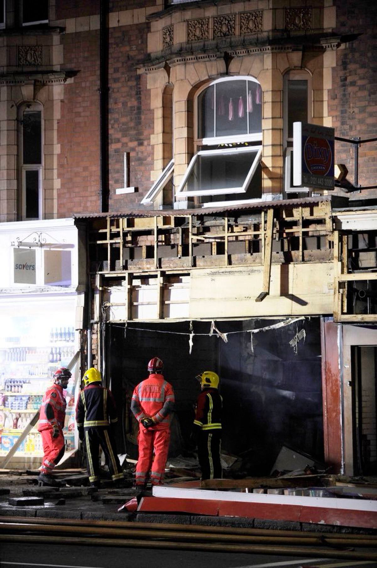 Men arrested after gas explosion sparks fire at Dixy Chicken takeaway ...