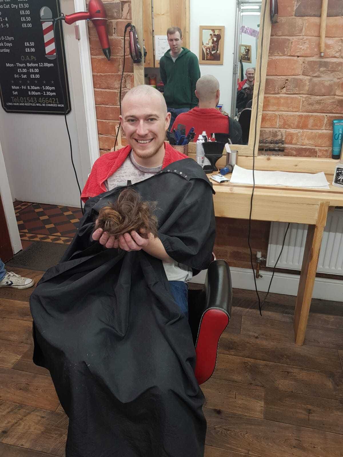 Worker raises £2,000 with head shave | Express & Star