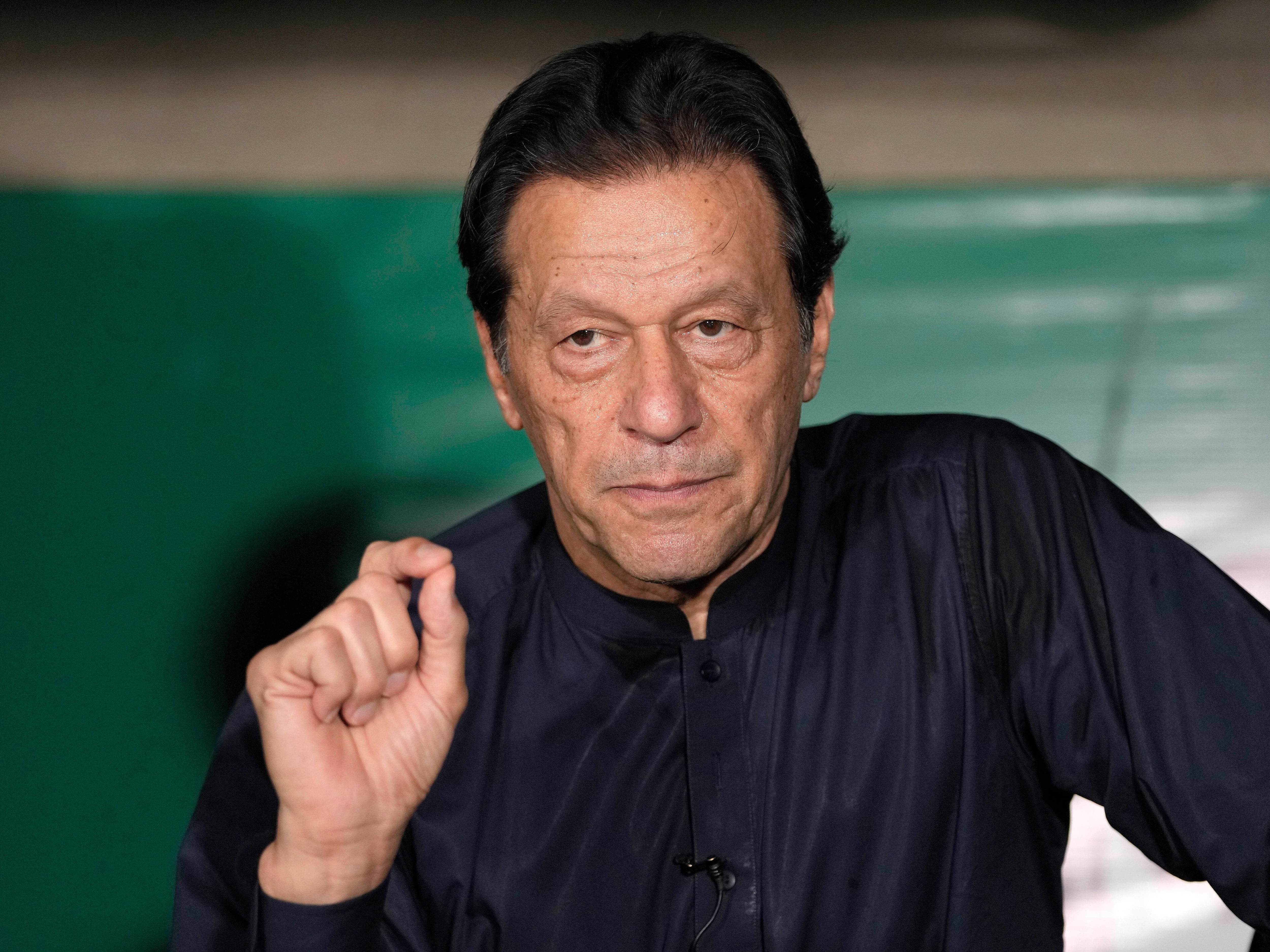 Pakistan police raid former PM Imran Khan’s party office and arrest spokesman