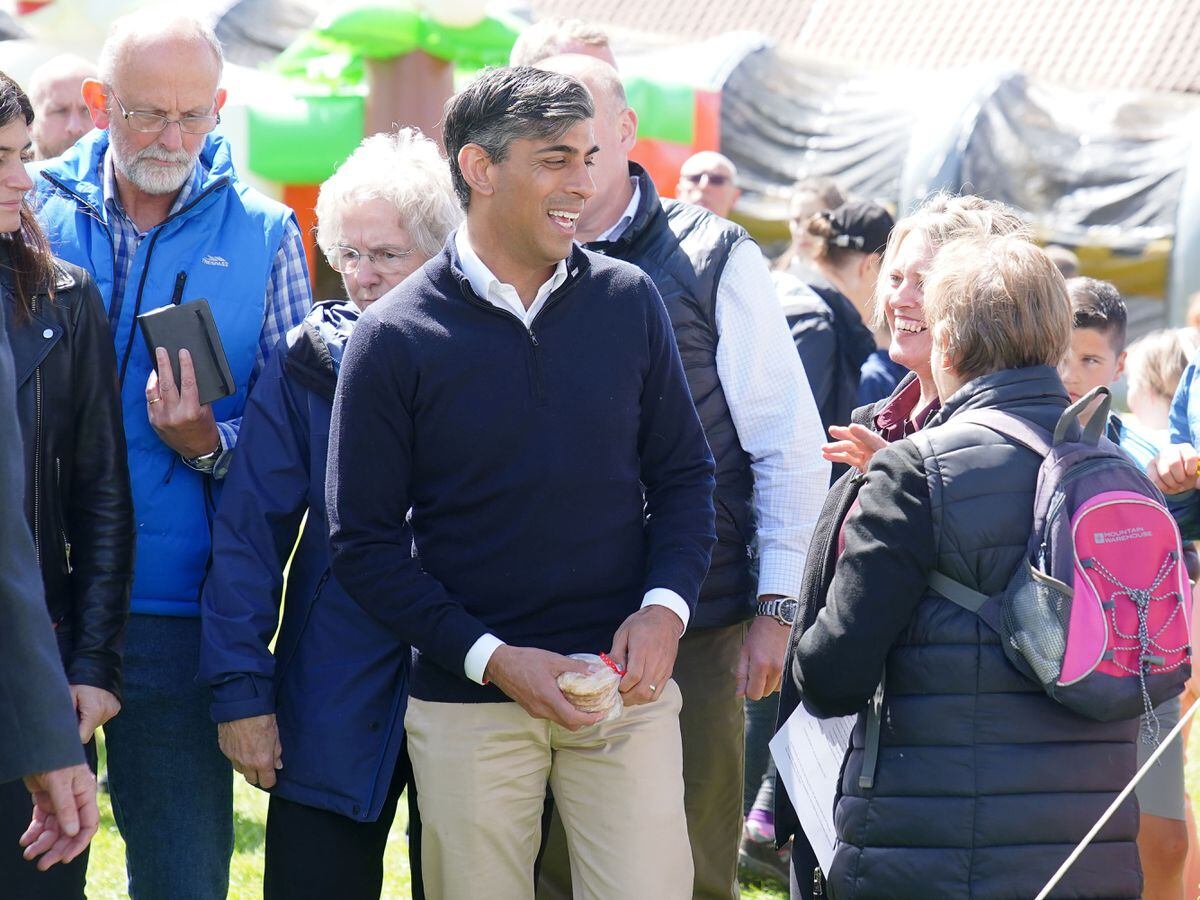 Rishi Sunak visits village fete on home soil after D-Day events ...