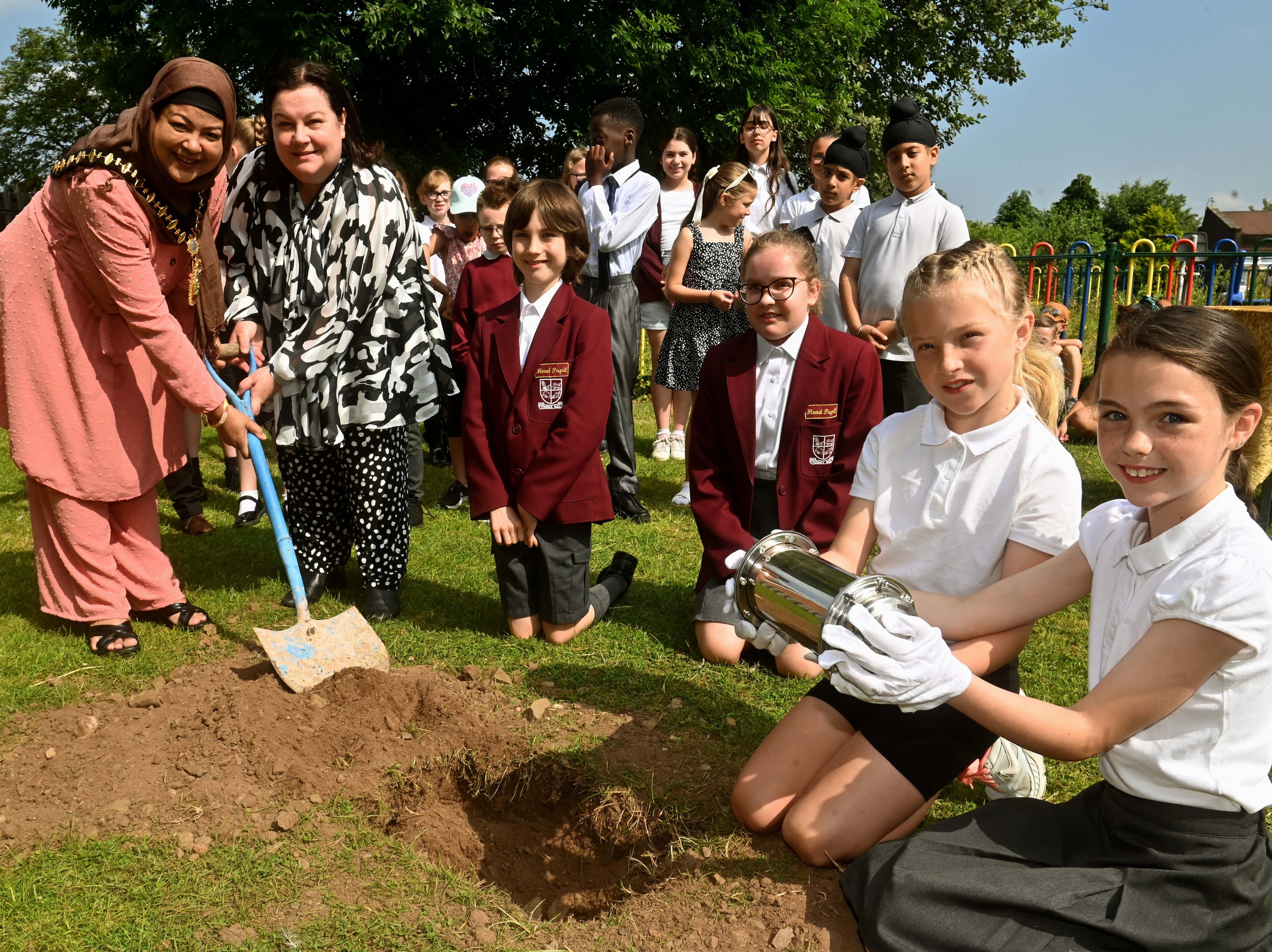 School buries lasting monument to school for future generations to view