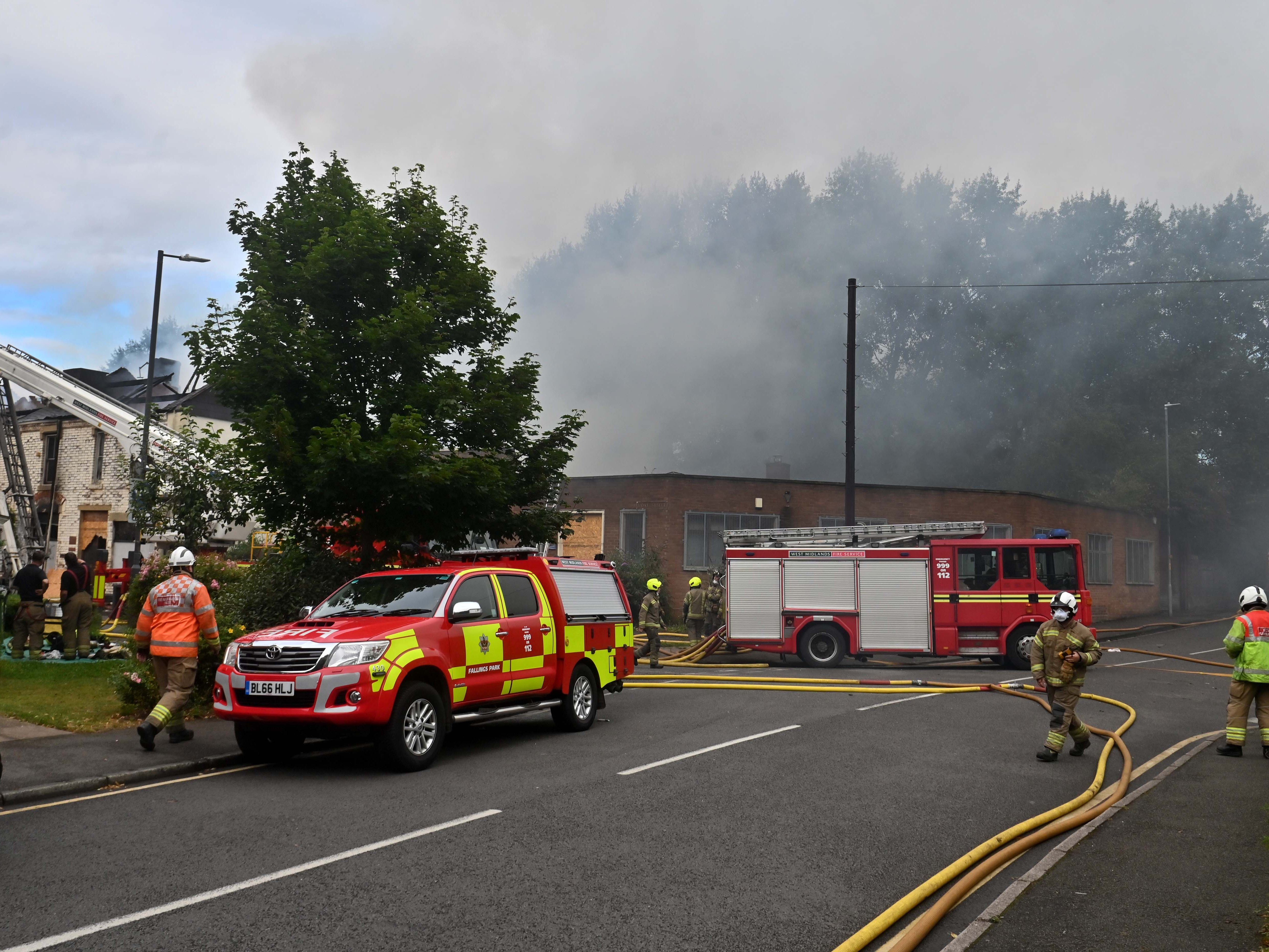 Watch: Fire crews battle factory blaze after locals woken by bangs that 'sounded like fireworks'