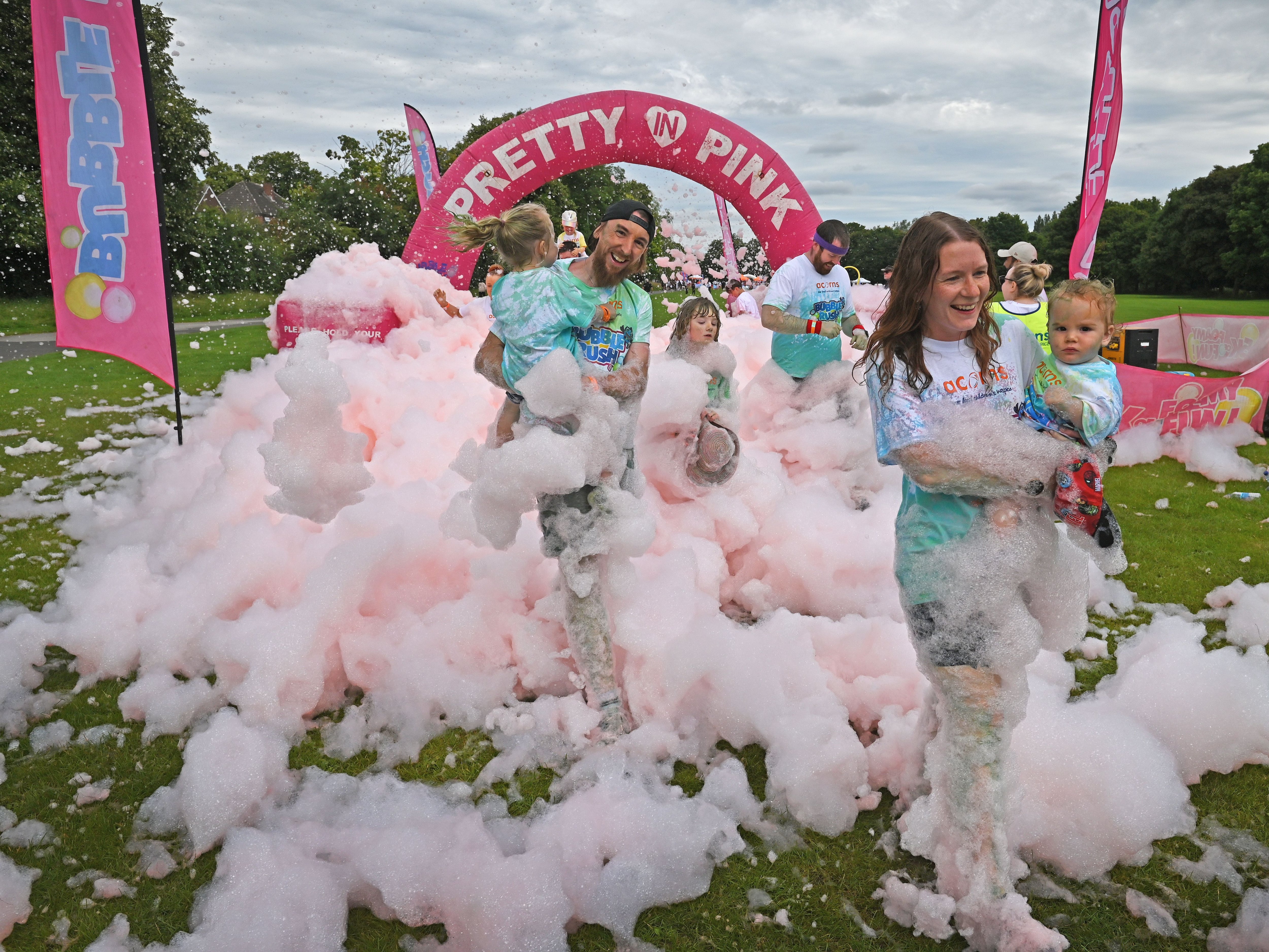 See our photos of fun in the foam as Bubble Rush charity event is sudsy success