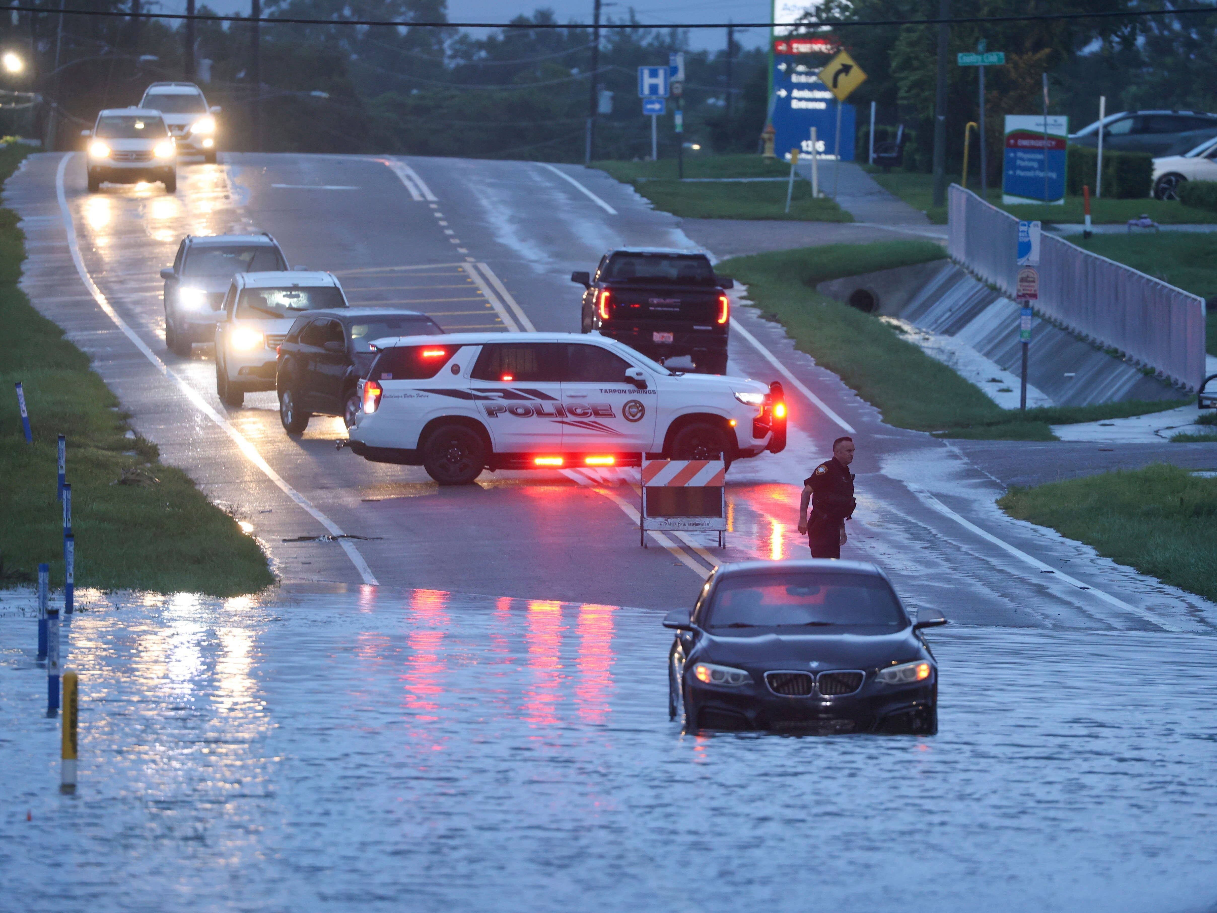 Tropical Storm Debby hits Florida with floods and threat of record rain