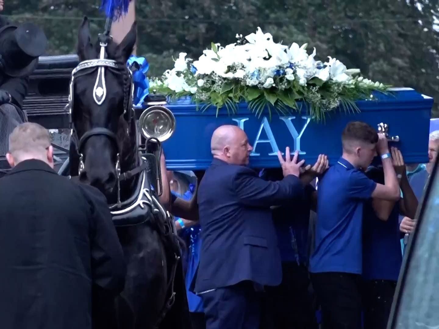 Jay Slater’s friends and family wear blue for funeral of ‘forever 19’ apprentice