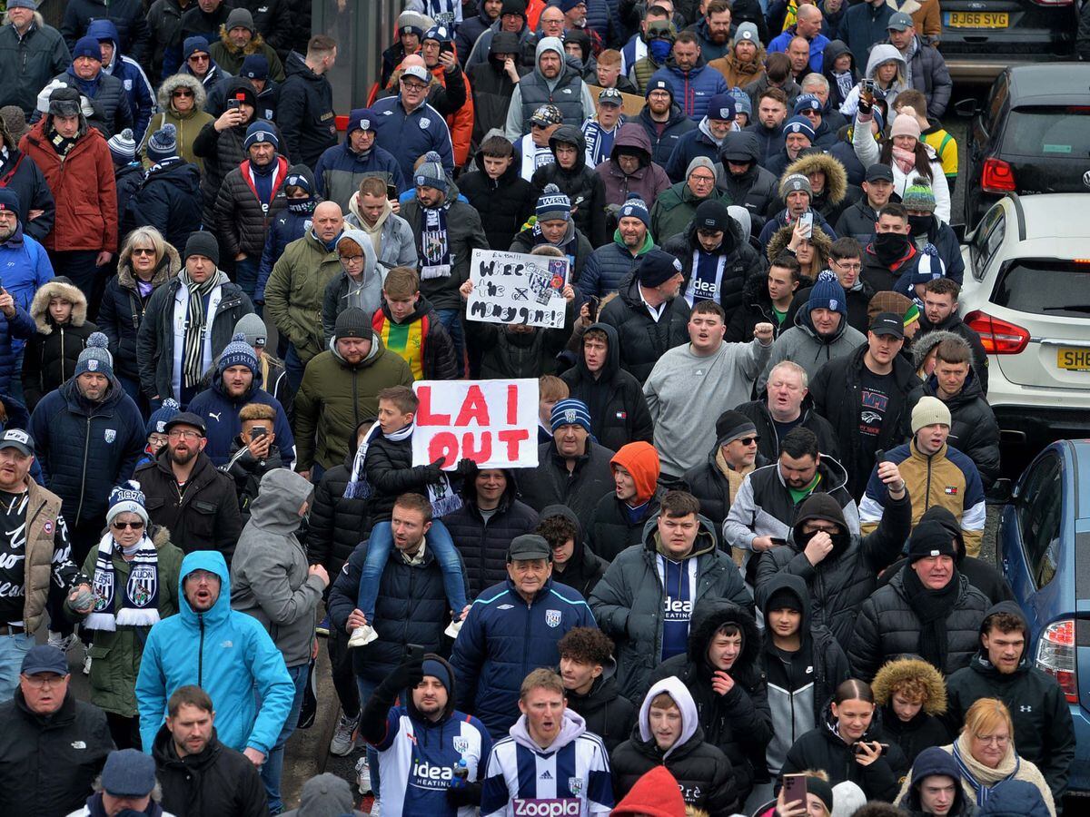 Peaceful march: West Brom fans unite in show of togetherness against  Guochuan Lai