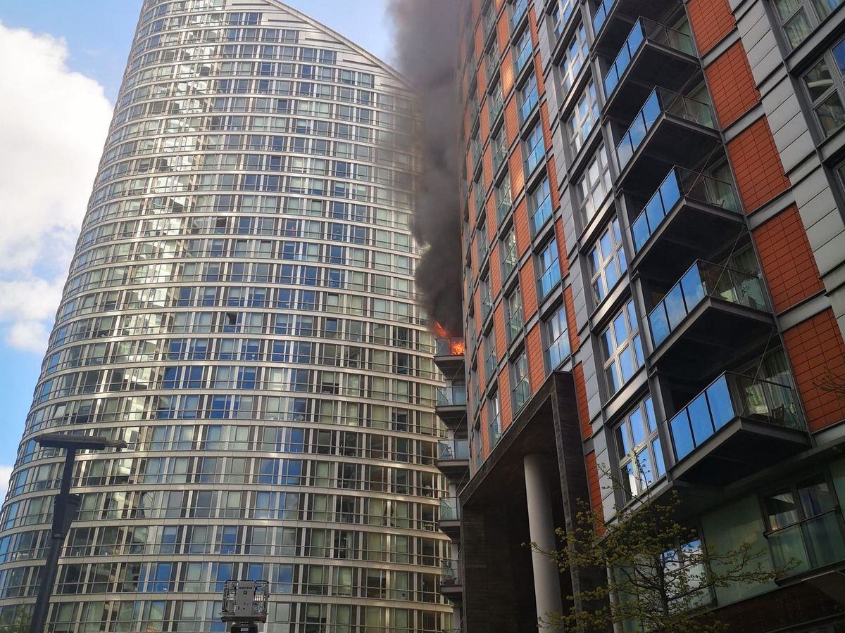 Blaze Engulfs Several Floors Of Tower Block Near Canary Wharf | Express ...