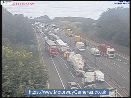 Drivers facing long delays after car overturns in crash on M6 