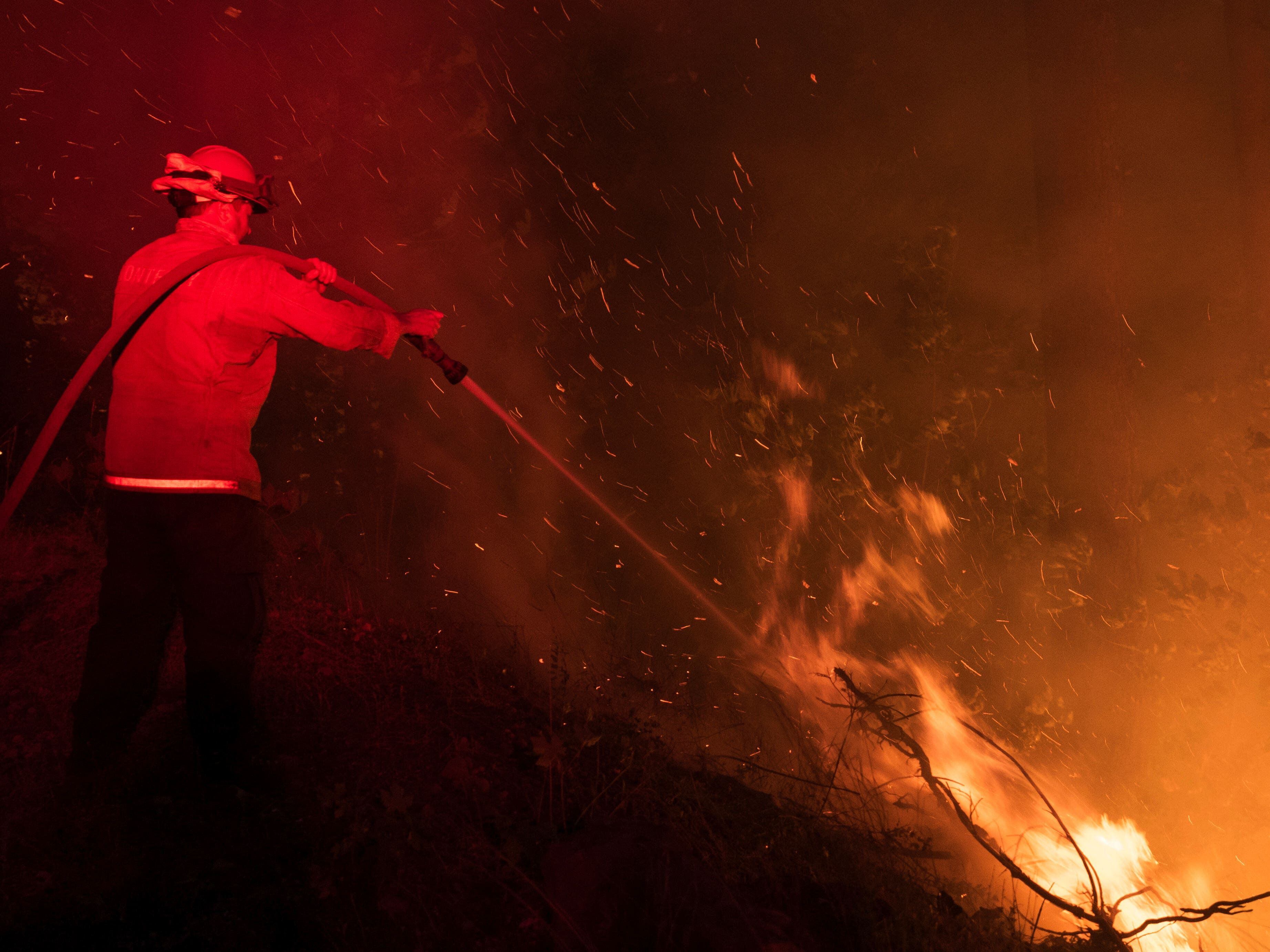 California firefighters make progress amid blaze devastation