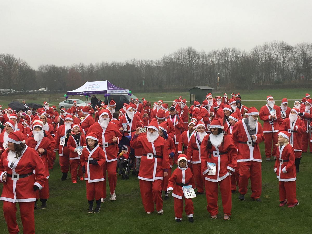 Hundreds of Sandwell Santas go dashing through the rain Express & Star