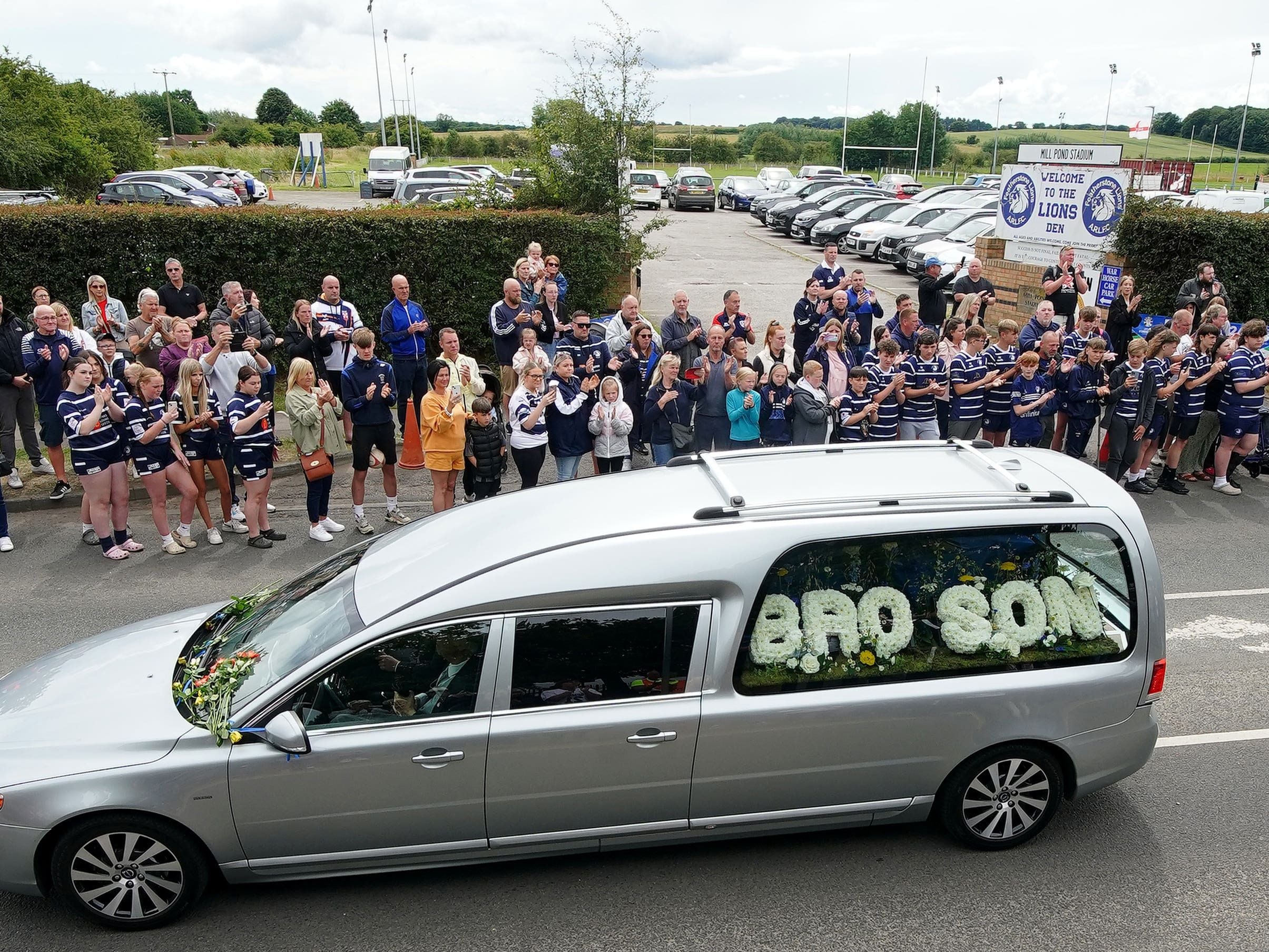 Thousands gather to pay final respects to Rob Burrow on funeral route