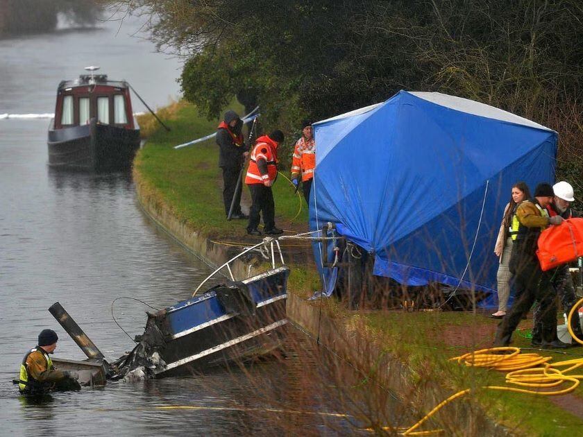 Expert river recovery team brought in to recover evidence from burnt out boat in which bodies of man and dog found