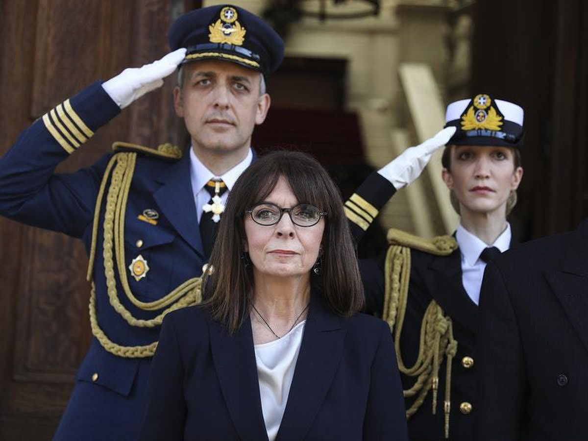 Greece’s first female president sworn in at almost empty parliament