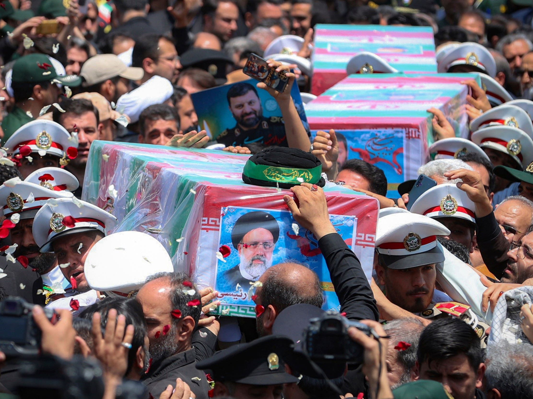 Iran begins burying late president and others killed in helicopter crash