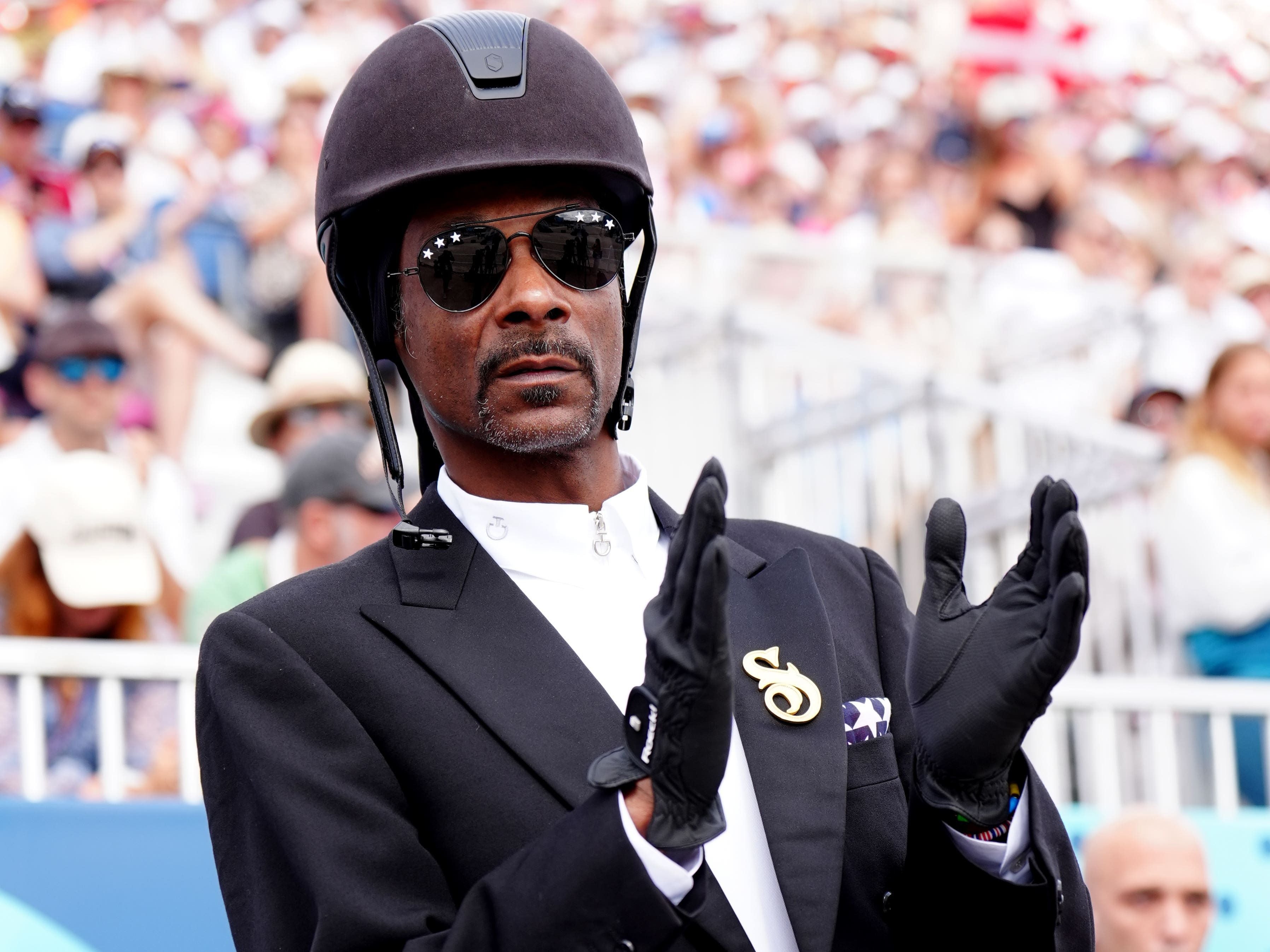 Snoop Dogg wears equestrian kit as he watches dressage at Paris Olympics