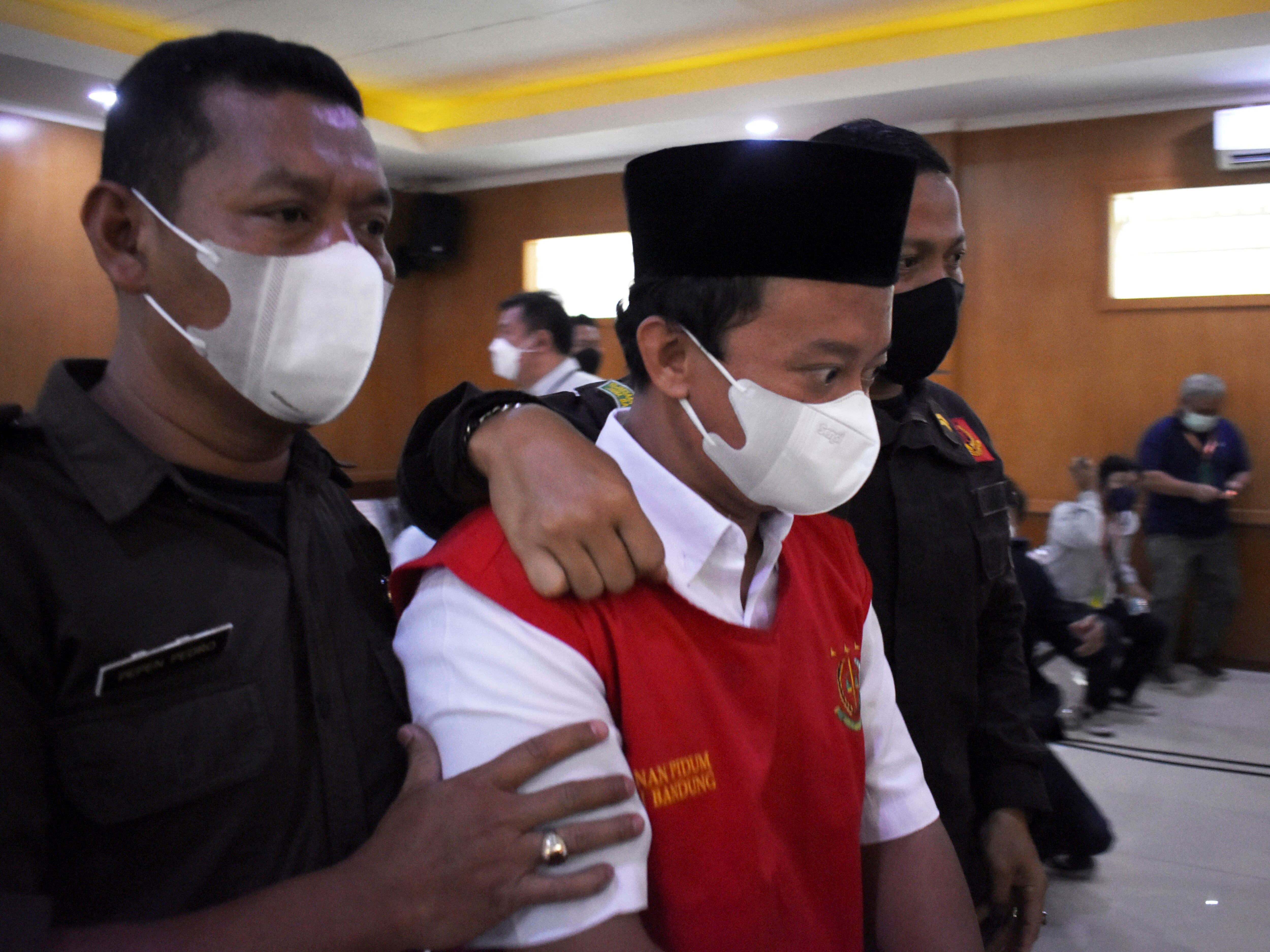 Headteacher in Indonesia sentenced to death for raping 13 girls