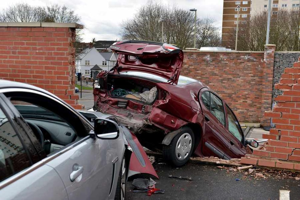 IN PICTURES: Car smashes through brick wall in town centre | Express & Star