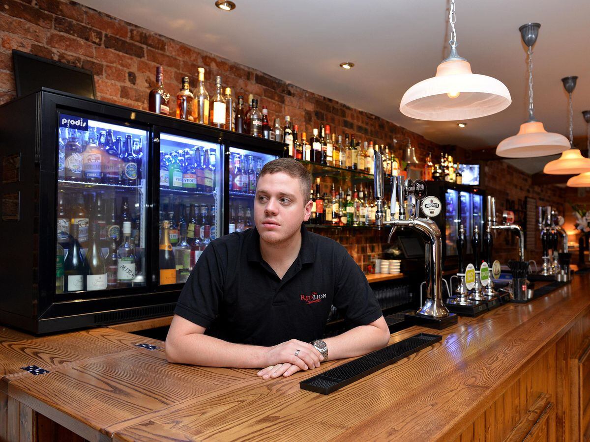 Landlord Philip Guy in the Red Lion Pub, in Brettell Lane, Stourbridge 