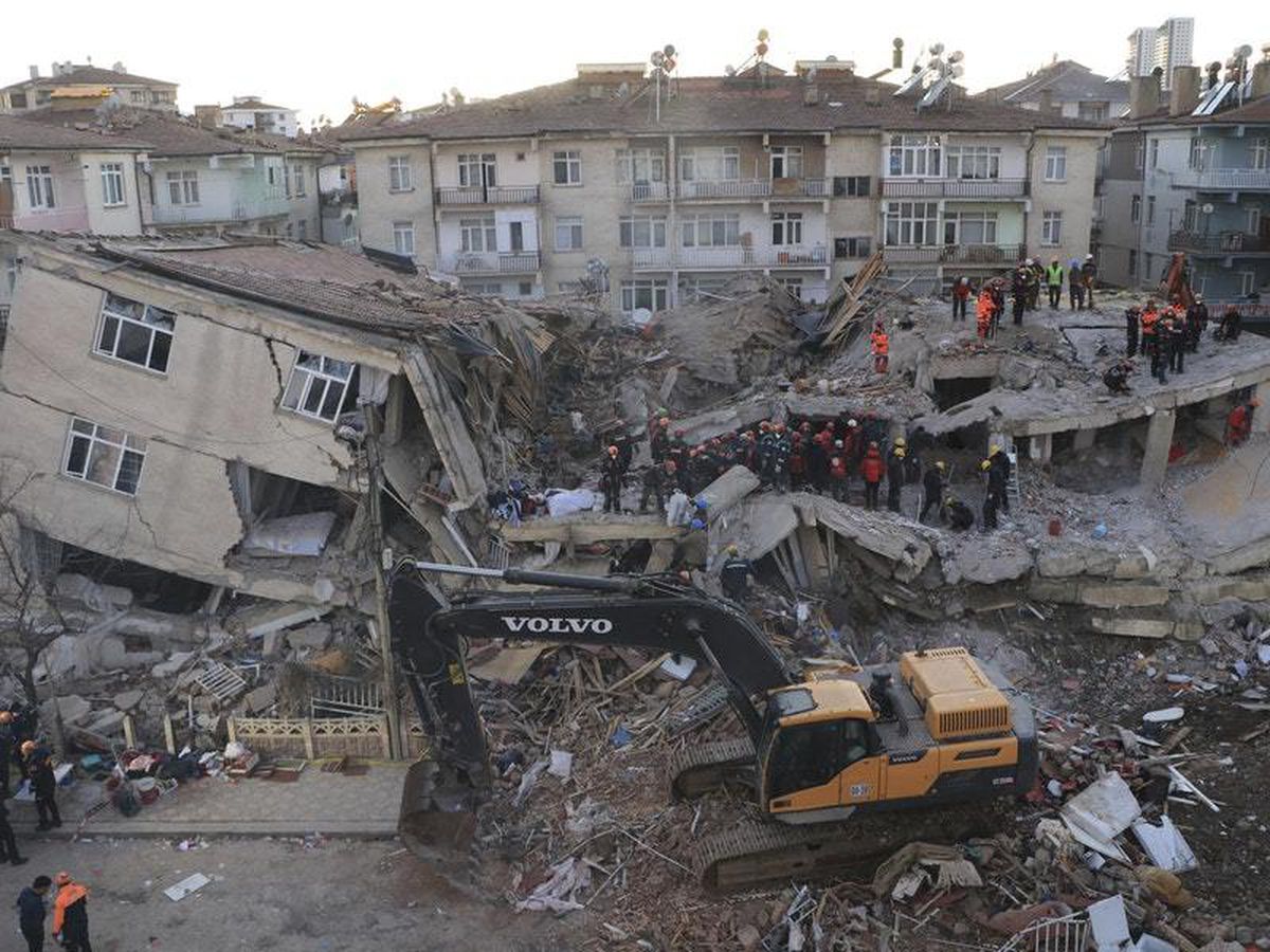 Turkish president visits quake scene and denies nation was unprepared