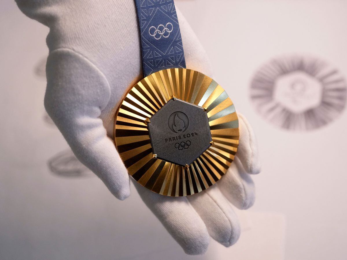 Medals for Paris 2024 Olympics embedded with pieces of Eiffel Tower ...