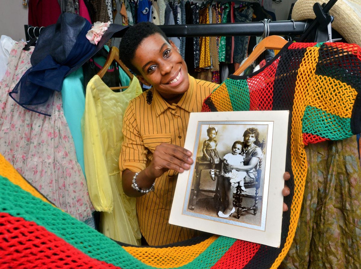 Dudley Copyright Shropshire Star Steve Leigh 12/10/2022.. Photo by Samantha Prescott in Dudley.  She created an exhibition/event at Brierley Hill Civic Hall with her grandmother Veena Prescott (the older woman in the photograph she holds).  Being a part of black history events, using contemporary fashion to create memories, etc.