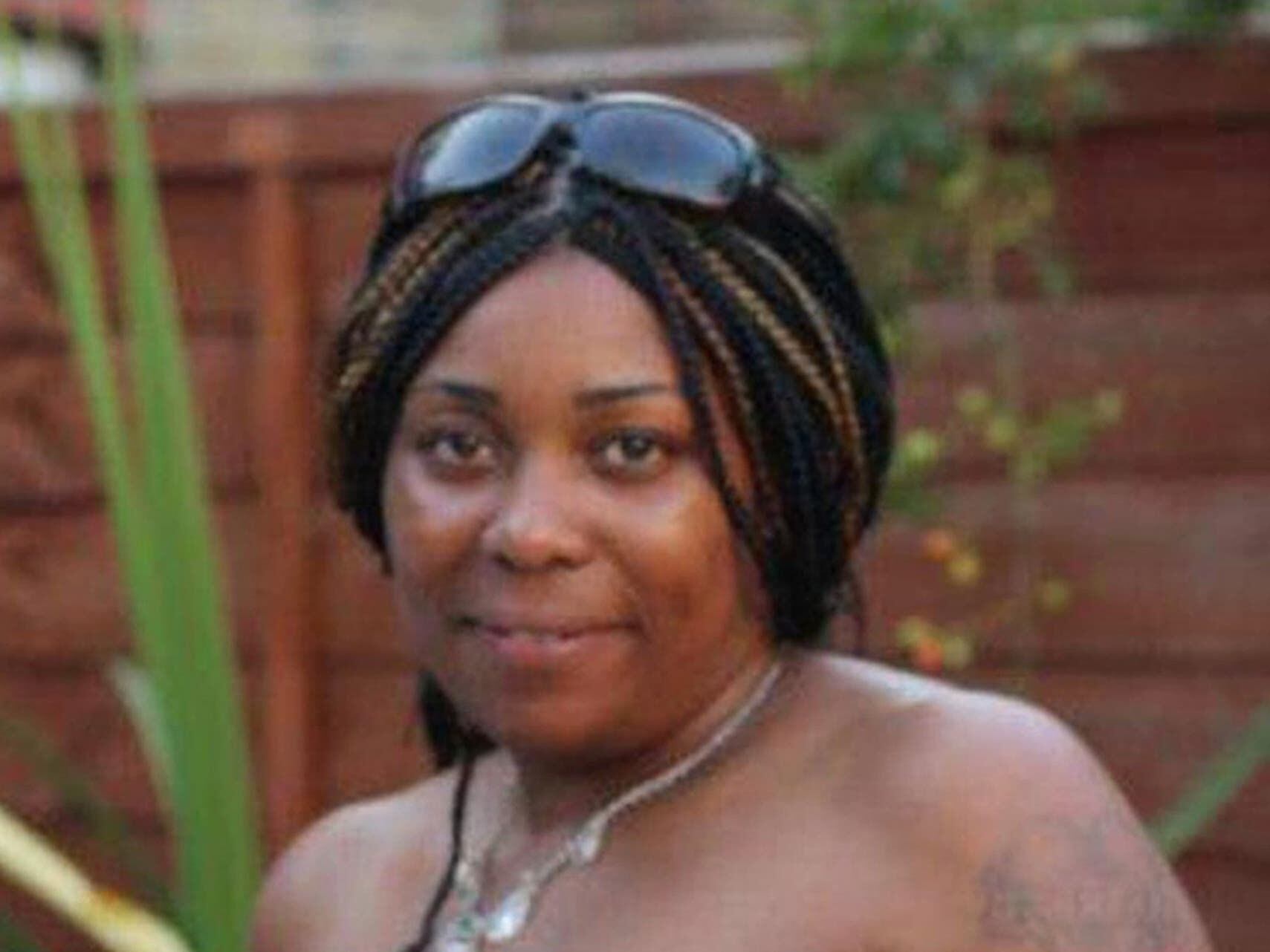Mother-of-two died trying to protect family, court told