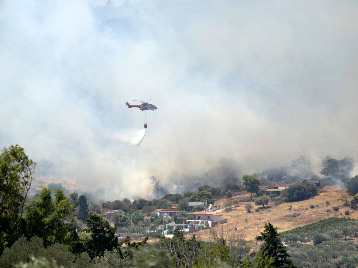 Firefighters grapple with more wildfires near Greece’s capital ...