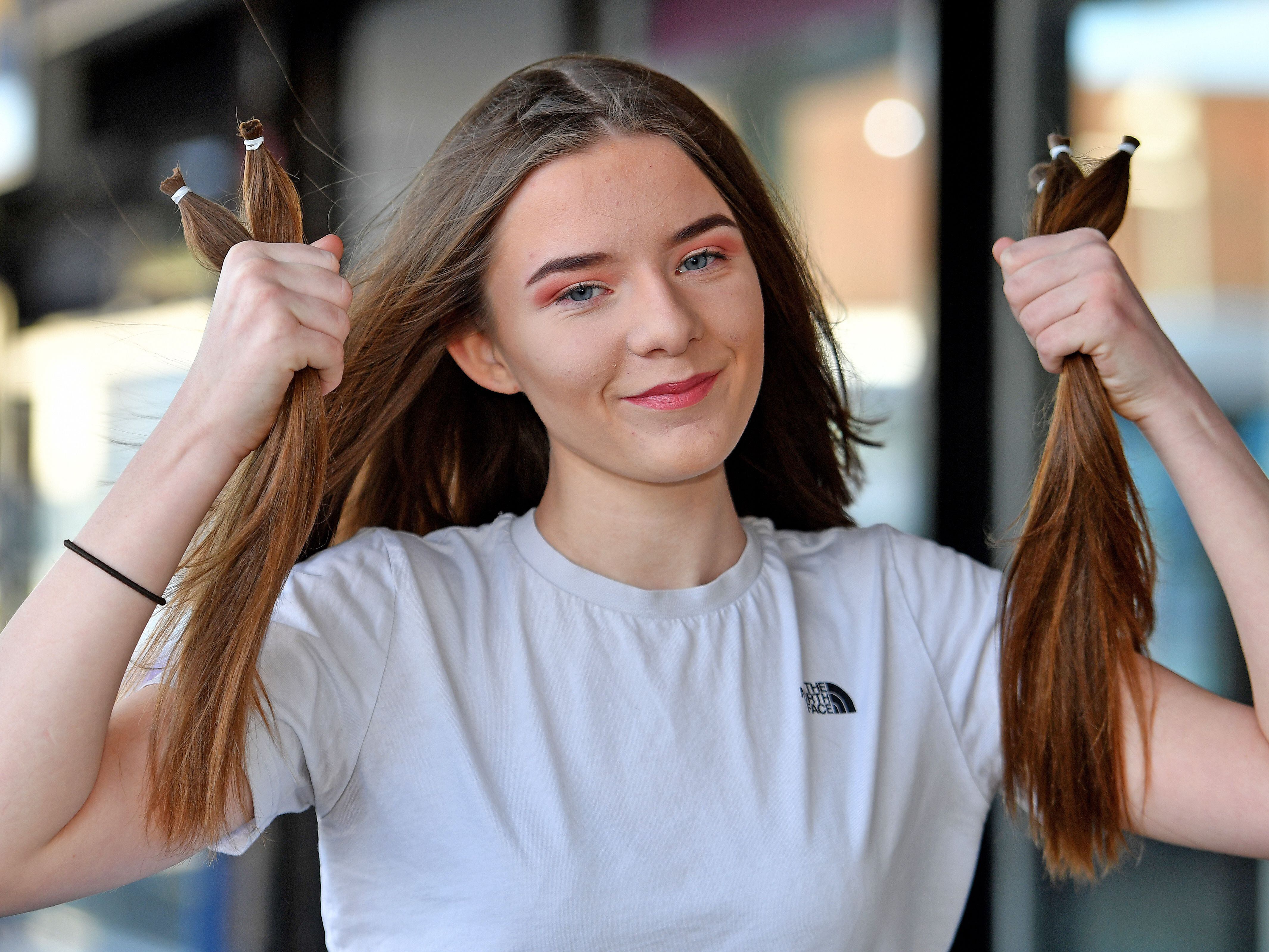 Teen gets the chop in aid of charity