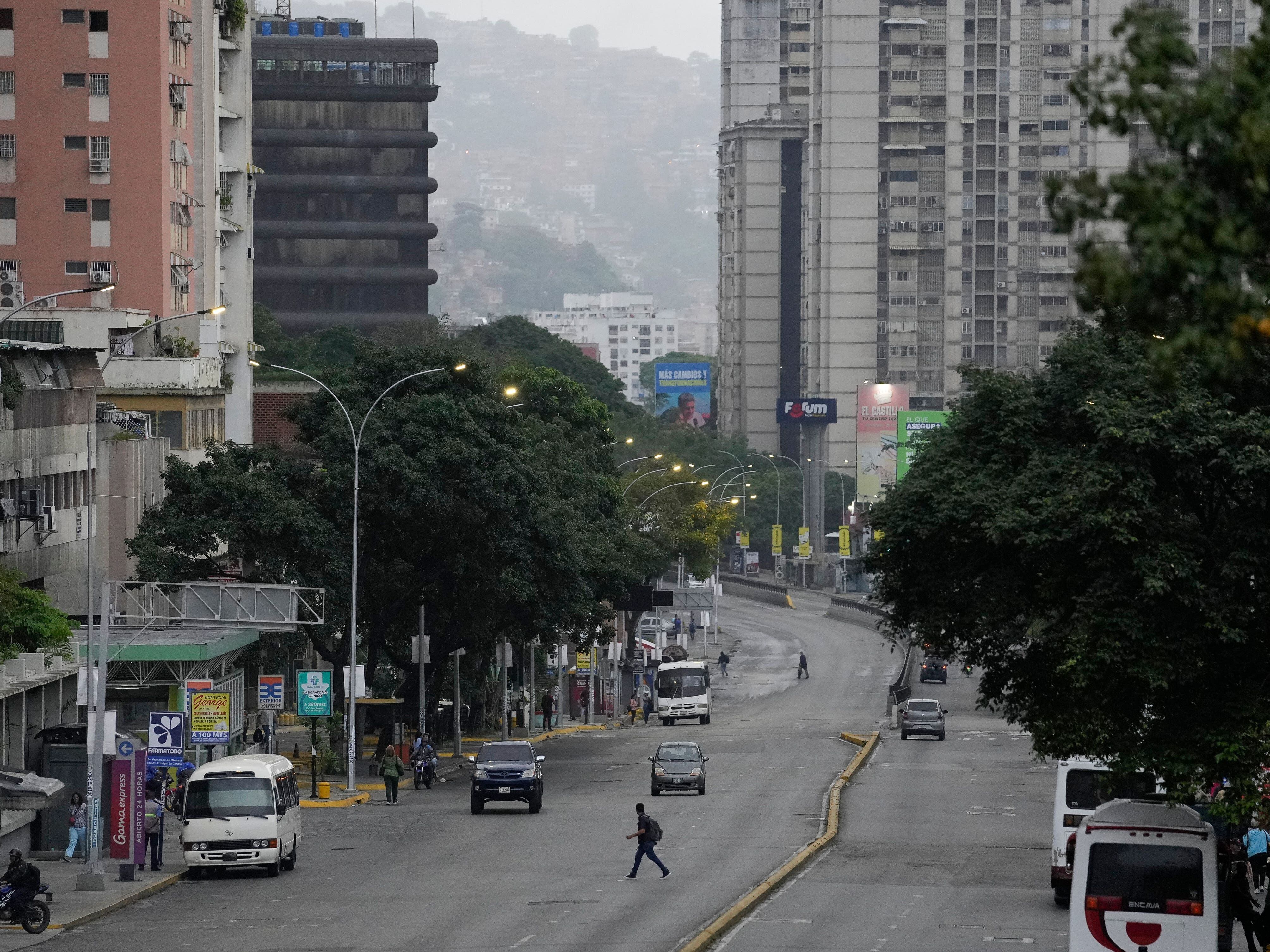 Venezuela capital eerily calm after Maduro and opposition claim election victory