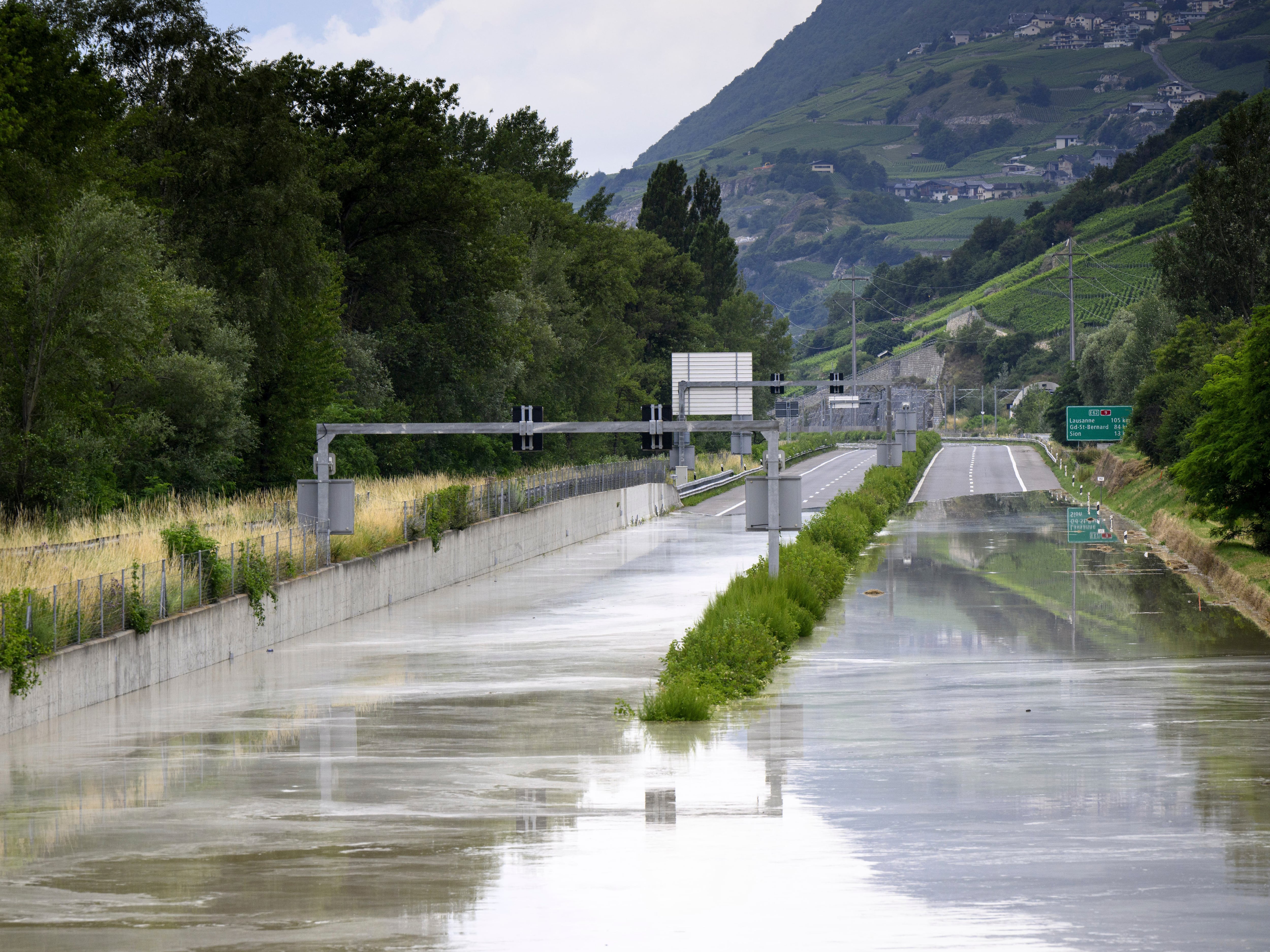 At least two dead as storms in Switzerland cause flooding and landslide