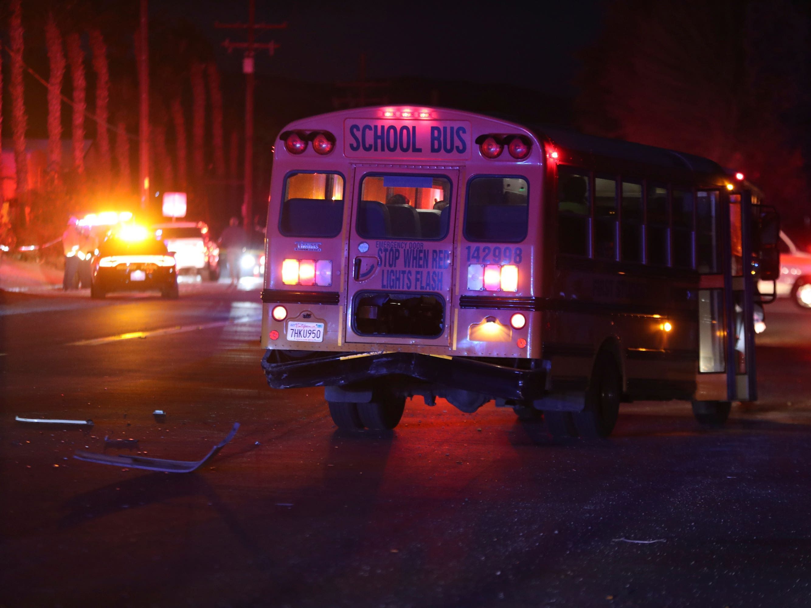 Girl, nine, killed as car hits school bus and ploughs into children